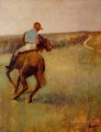 Jinete de azul sobre un caballo castaño Edgar Degas